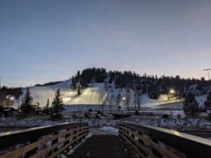 image of ski slopes from the perspective of a bridge